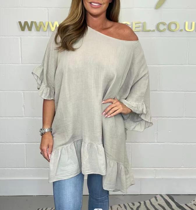 Loose, pleated blouses with an off-the-shoulder neckline for women — elegant and feminine