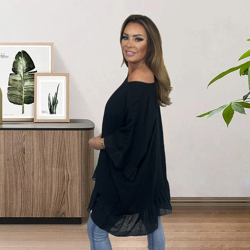 Loose, pleated blouses with an off-the-shoulder neckline for women — elegant and feminine