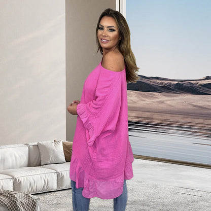 Loose, pleated blouses with an off-the-shoulder neckline for women — elegant and feminine